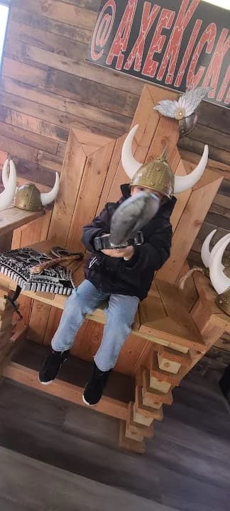 Photo of Axe Kicking Entertainment Axe throwing Archery Fowling