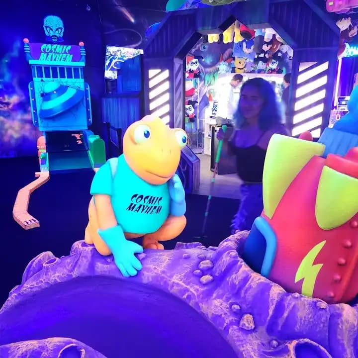 Photo of Cosmic Mayhem: Black Light Mini Golf and Bar