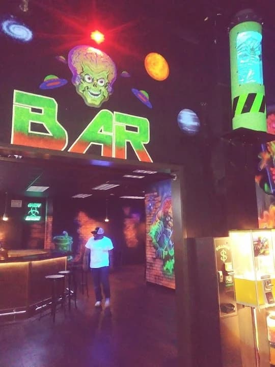 Cosmic Mayhem: Black Light Mini Golf and Bar image 9