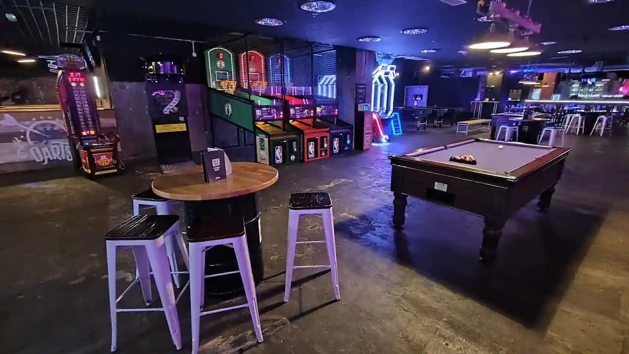 Interior view of Boom Battle Bar Liverpool axe throwing facility in Liverpool