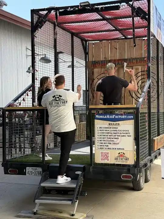 Interior view of Mobile Axe Factory axe throwing facility in Dallas