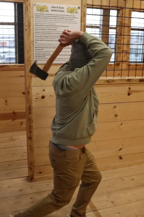 Interior view of Ales & Axes axe throwing facility in Toronto